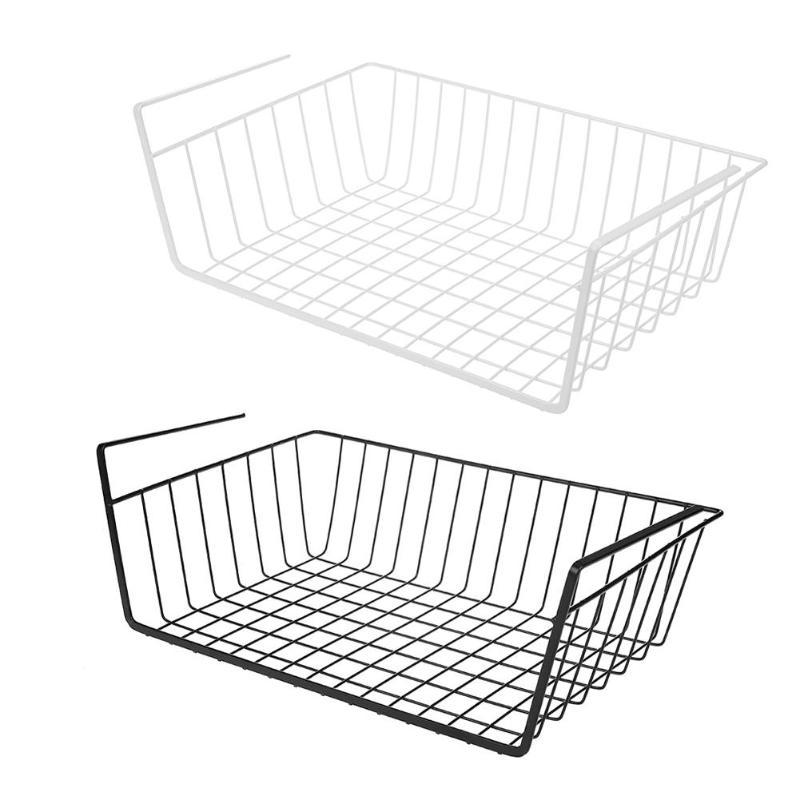 Wrought iron storage basket used for home organization, holding household items neatly on a shelf or countertop