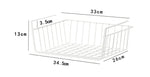 Wrought iron storage basket used for home organization, holding household items neatly on a shelf or countertopWrought iron storage basket used for home organization, holding household items neatly on a shelf or countertop