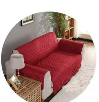 Durable sofa couch cover neatly fitted over a couch, protecting the furniture and giving it a fresh, clean look