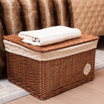 Rattan wicker storage basket with lid, ideal for home organization and adding a natural, rustic touch to interior decor