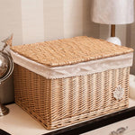 Rattan wicker storage basket with lid, ideal for home organization and adding a natural, rustic touch to interior decor