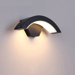Wall-mounted Curved Moon LED Light emitting warm glow, dimmable and motion-activated, ideal for hallways and entrances.