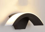 Elegant Curved Moon LED Wall Light with soft white illumination, stylish arc shape enhances contemporary home or hotel decor.
