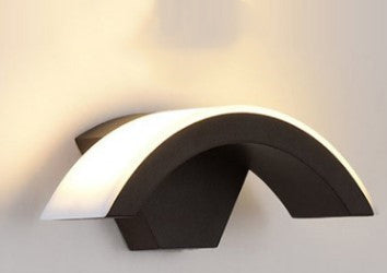 Elegant Curved Moon LED Wall Light with soft white illumination, stylish arc shape enhances contemporary home or hotel decor.