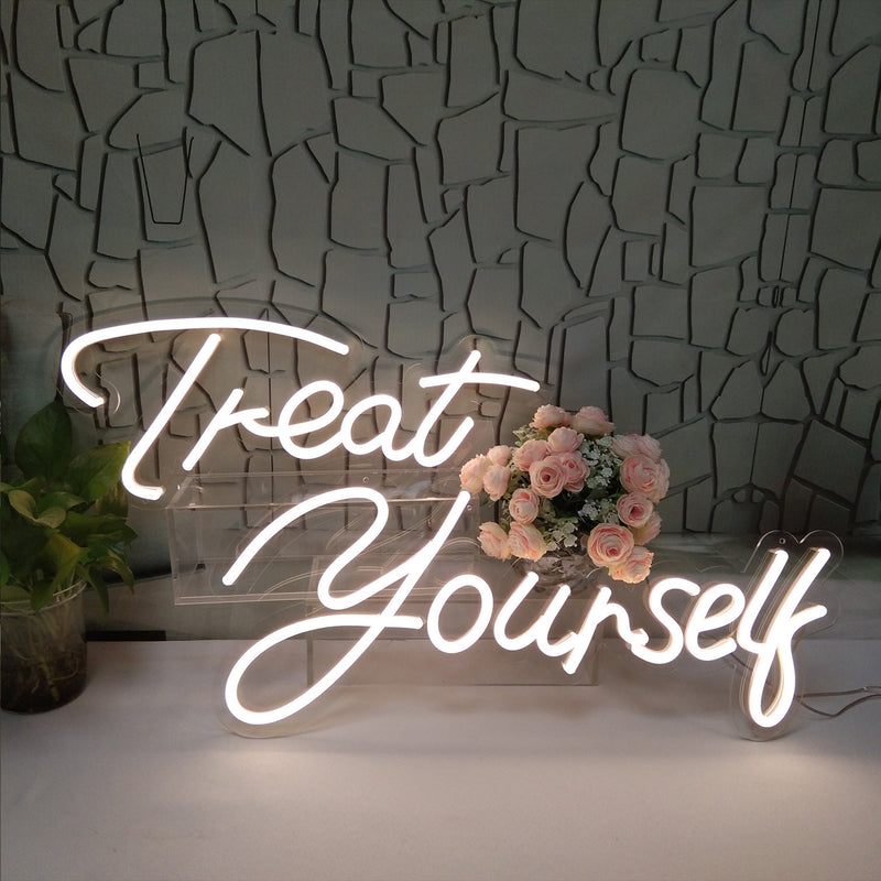 Treat Yourself LED Neon Sign in white script, matching the Oh Baby LED Neon Sign - Birthday Light Decor for self-care or celebration themes.