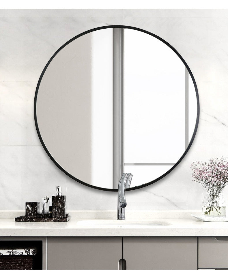 Large Curve Culture bathroom vanity mirror with slim black aluminum frame above a modern sink, offering high-definition silver clarity.
