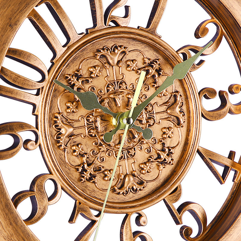 Close-up of European Retro Wall Clock center showing intricate floral carvings and gold-tone hands, highlighting vintage craftsmanship.