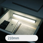 USB rechargeable LED sensor light bar mounted under a cabinet, emitting bright white light with a sleek modern designUSB rechargeable LED sensor light bar mounted under a cabinet, emitting bright white light with a sleek modern design