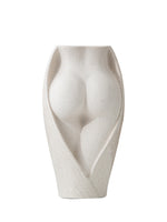 Modern ceramic vase featuring a sculpted female torso design in matte beige, perfect for artistic floral arrangements or standalone decor.