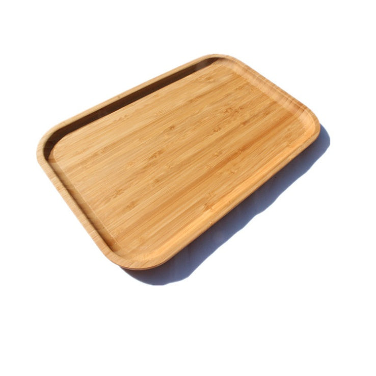 Bamboo tea and food dessert tray with handles, used for serving drinks or snacks, featuring a natural and eco-friendly design.