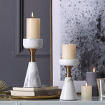 Set of Elegant Marble Candle Holders with lit candles on a console table, showcasing timeless design for sophisticated interiors.
