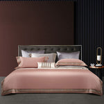 Elegant 4-piece embroidered bedding set with 140 thread count, displayed on a neatly made bed for a luxurious bedroom look