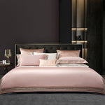 Elegant 4-piece embroidered bedding set with 140 thread count, displayed on a neatly made bed for a luxurious bedroom look