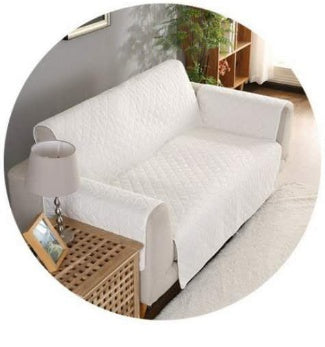 Durable sofa couch cover neatly fitted over a couch, protecting the furniture and giving it a fresh, clean look