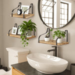 Wood Floating Shelves - Set of 3 mounted in a bathroom, decorated with plants and framed photos, ideal for stylish and functional wall storage.
