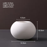 Scandinavian ceramic vase with a minimalist design, perfect for modern home decor and displaying fresh or dried flowers.