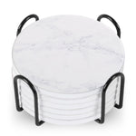 Set of 6 ceramic beverage coasters with an elegant holder stand, designed to protect tabletops and add a stylish touch to home decor.