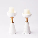 Pair of Elegant Marble Candle Holders with white candles, combining simplicity and style for upscale home accents.