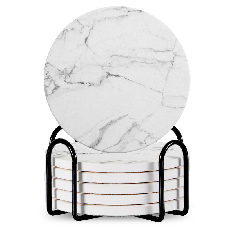 Set of 6 ceramic beverage coasters with an elegant holder stand, designed to protect tabletops and add a stylish touch to home decor.