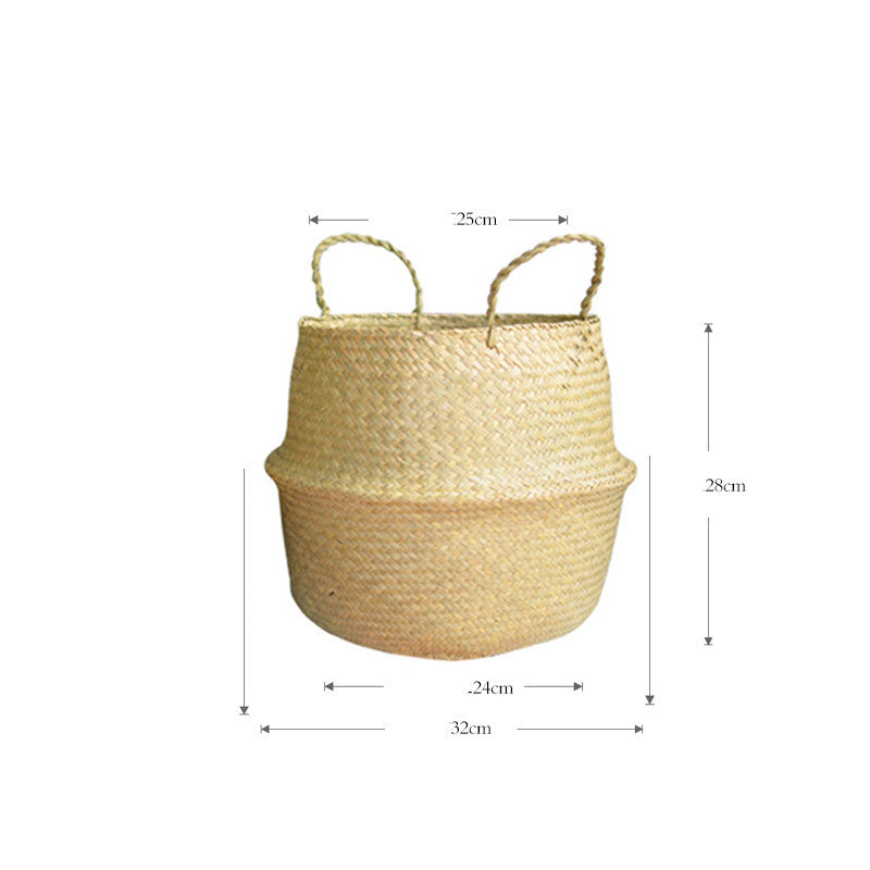 Portable seagrass woven flower storage basket with handles, used for organizing items or displaying plants in natural home decor style