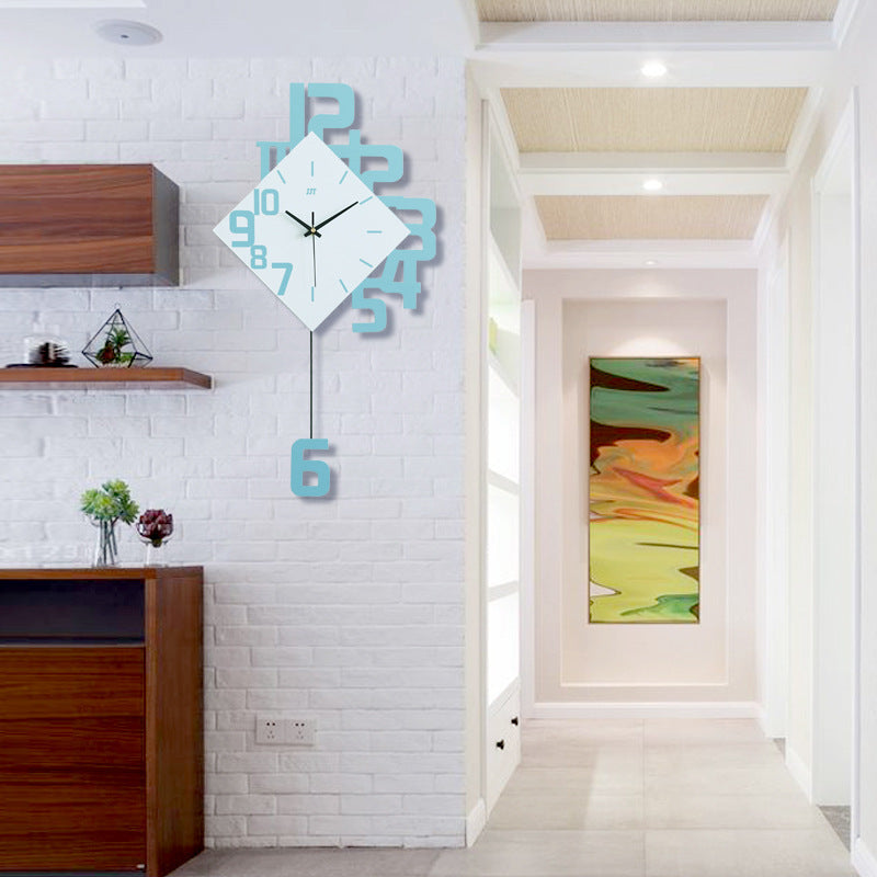 Blue creative fashion wall clock with quartz movement and unique number layout, mounted on a white brick wall. Personalized 15-inch home decor.