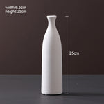 Scandinavian ceramic vase with a minimalist design, perfect for modern home decor and displaying fresh or dried flowers.