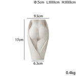 Small modern ceramic vase with sculpted female form, measuring 17cm tall and 0.4kg, ideal for compact floral displays or shelf decor.