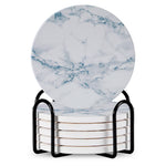 Set of 6 ceramic beverage coasters with an elegant holder stand, designed to protect tabletops and add a stylish touch to home decor.