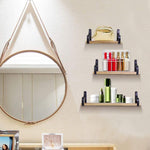 3 Pcs Wood Floating Shelves - Wooden Floating Shelves used in a vanity setup, holding cosmetics and toiletries for organized bathroom storage.