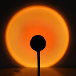Golden-orange projection from Sunset Projection Lamp - Adjustable Decor, perfect for creating a sunset-inspired room atmosphere.