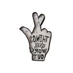 Minimalist LED neon wall sign with a hand gesture and inspirational quote, designed for cafes, bars, or creative interiors.