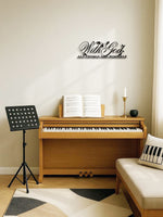 Inspirational Bible Verse Metal Wall Art above a piano in a music room. 'With God All Things Are Possible' sculpture for USA Christian home decor.