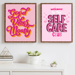 Funny Quotes Art - Modern Inspirational Poster duo with 'Good Vibes Mostly' and 'Self Care Club' quotes in bold pink frames for wall decor.