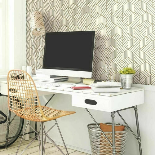 Removable hexagon peel and stick wallpaper in a modern home office with white desk and gold wire chair. Ideal for easy wall upgrades.